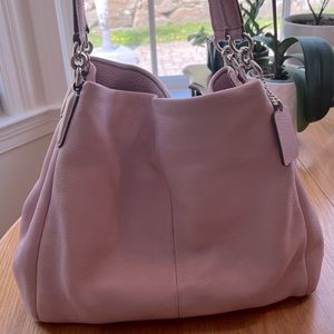 Coach.  Pink bag.  Soft leather with great storage.